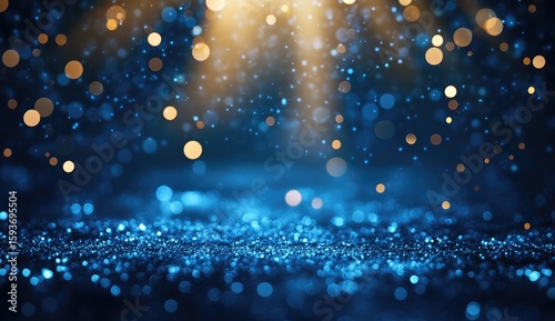 Dark blue glitter background with golden light