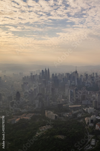 Canvas Print first light of dawn breaks over Kuala Lumpur