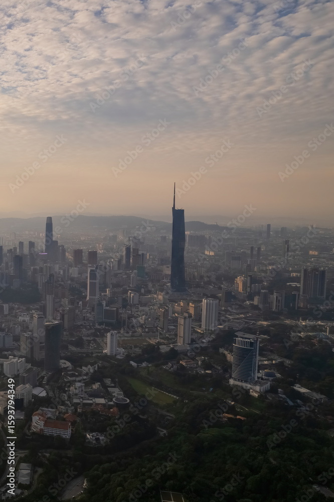 Fototapeta premium first light of dawn breaks over Kuala Lumpur