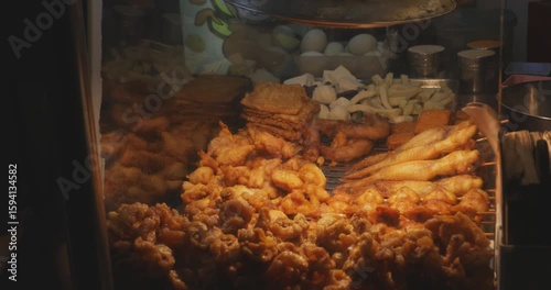 Fried chicken at Ningxia night market in Taipei handheld shot
