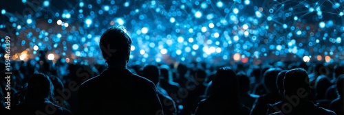 Enthralling crowd watches a mesmerizing digital light show creating a feeling of wonder and awe with