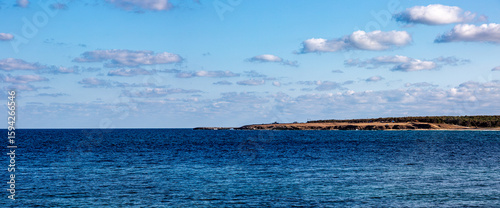 View to sea, shore and blue sky