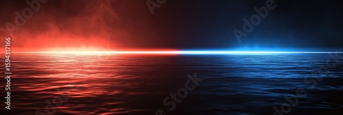 Red and blue light reflecting on a dark water surface