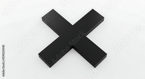 Black X Shape on White Surface