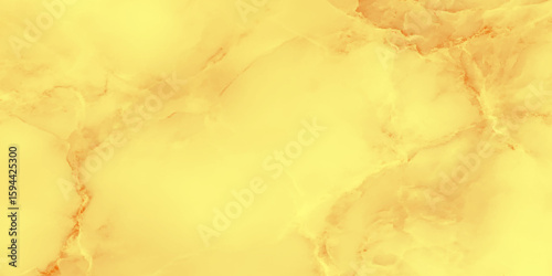 Dominated by warm yellow and soft orange hues, it features swirling veins and gentle gradients that create a polished, from pale yellow to deeper orange tones.