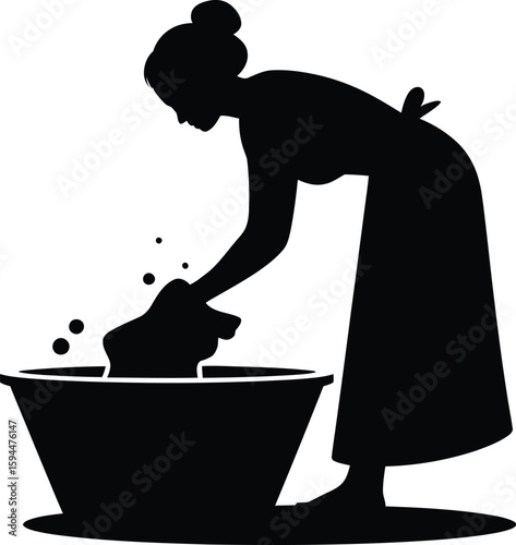 Silhouette of Woman Washing Clothes in a Tub with Bubbles