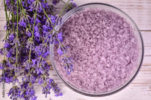 Purple aroma bath salt with dry lavender, close up, top view