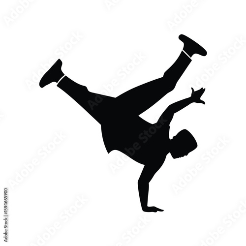 Dynamic black silhouette of a man performing a breakdance move with energetic flair