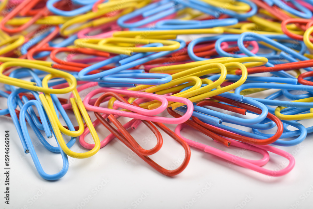 Many colorful paper clips isolated on white background Many colorful paper clips isolated on white background