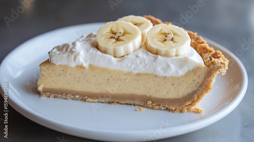 Wallpaper Mural Slice of Banana Cream Pie with Whipped Topping and Fresh Banana Slices Torontodigital.ca