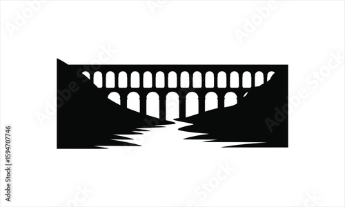 Ancient stone aqueduct structure silhouette