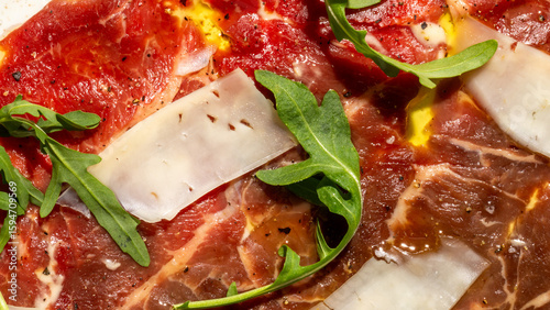 Slika na platnu Succulent cured meats dance with peppery arugula, evoking an Italian Festa della