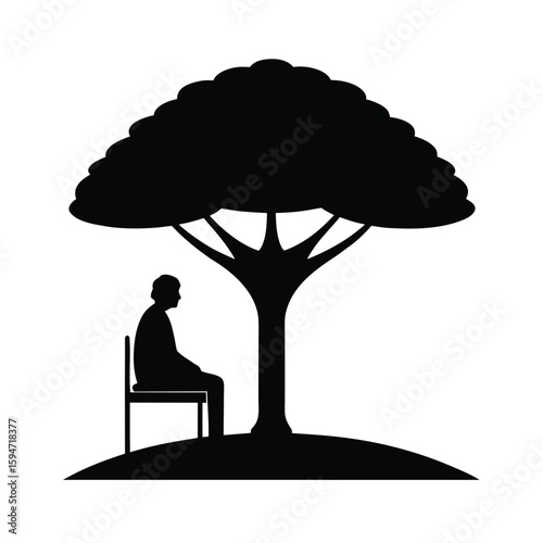 Silhouette of an elderly person peacefully sitting on a park bench enjoying a quiet moment