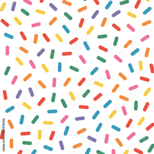 Sprinkles Pattern with Colorful Oblong Pieces on a White Seamless Background