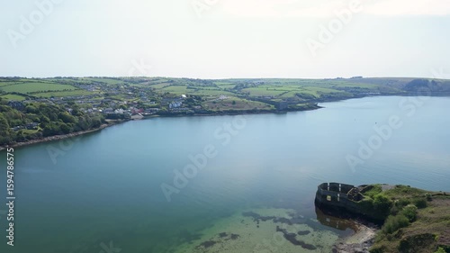 Serene coastal views of a tranquil harbor at dusk, capturing nature's beauty and the charm of the countryside