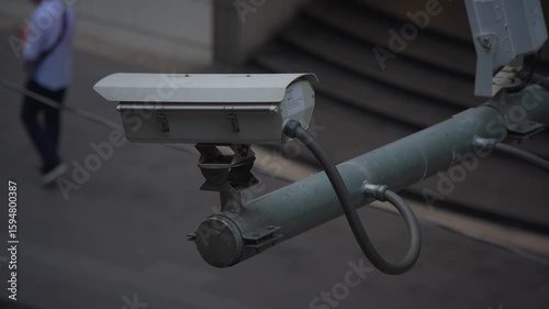 A surveillance camera is monitoring a public area for safety and security purposes