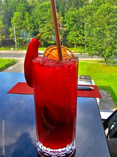 Cocktail with red pepper and lemon