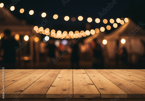 An inviting wooden tabletop foregrounding a blurred, lively evening event bathed in warm, soft lights.

