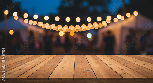Cozy outdoor event scene featuring a clear wooden table, glowing bokeh lights, and blurred partygoers.

