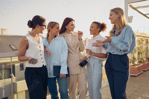 Slika na platnu Diverse women network outdoors, showcasing style and making connections in a vib