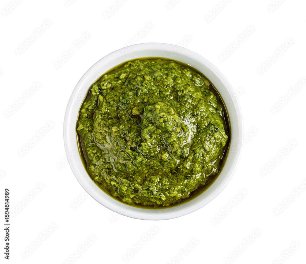Green pesto sauce in small bowl on transparent background Green pesto sauce in small bowl on transparent background