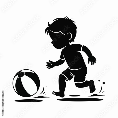 Black silhouette of a young boy chasing a striped beach ball on a sandy surface child black and white