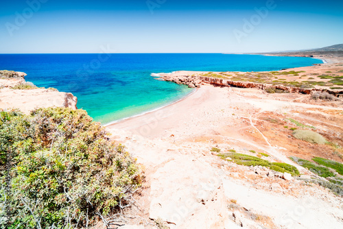 Fototapeta Naklejka Na Ścianę i Meble -  Cyprus most beautiful beach with turquoise waters in a bay near Paphos. White River Beach.