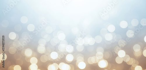 Abstract background with bokeh lights in blue, white, and gold tones, delivering a classy and festive feel great for elegant product presentations, celebration themes, or premium digital content.