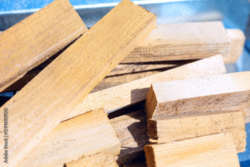 Stacked firewood, showcasing the natural grain and texture of the wood. Prepared firewood, neatly arranged and ready for a cozy fire. Lumber in a pile