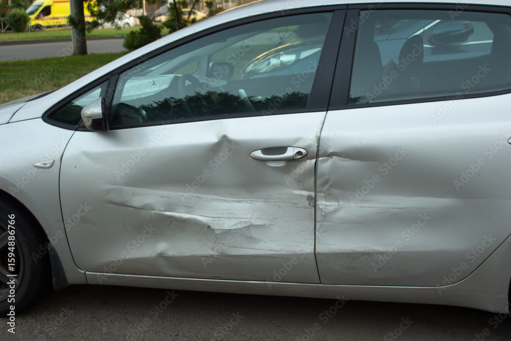 Fototapeta premium dent on the car, broken car