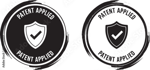 Black and white patent applied emblems with shield, patent, applied, emblem, shield, checkmark, protection, legal, intellectual property, trademark, certification, approval, official, document, seal, 