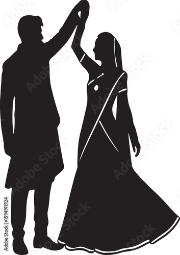 Indian couple silhouette dancing at wedding celebration
