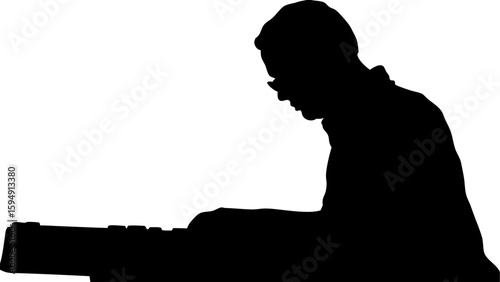 Silhouette of a person with glasses playing a keyboard in a dark room with a white background light