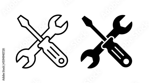 Vector art of two crossed tools, a wrench and a screwdriver, symbolizing repair and maintenance