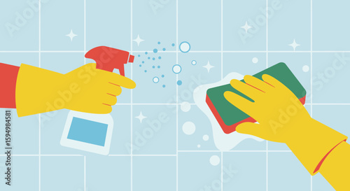 Yellow gloved hands cleaning with spray bottle and sponge