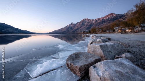 Mountain lake sunrise, ice, rocks, houses