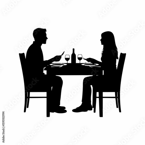 silhouette of a couple having dinner together