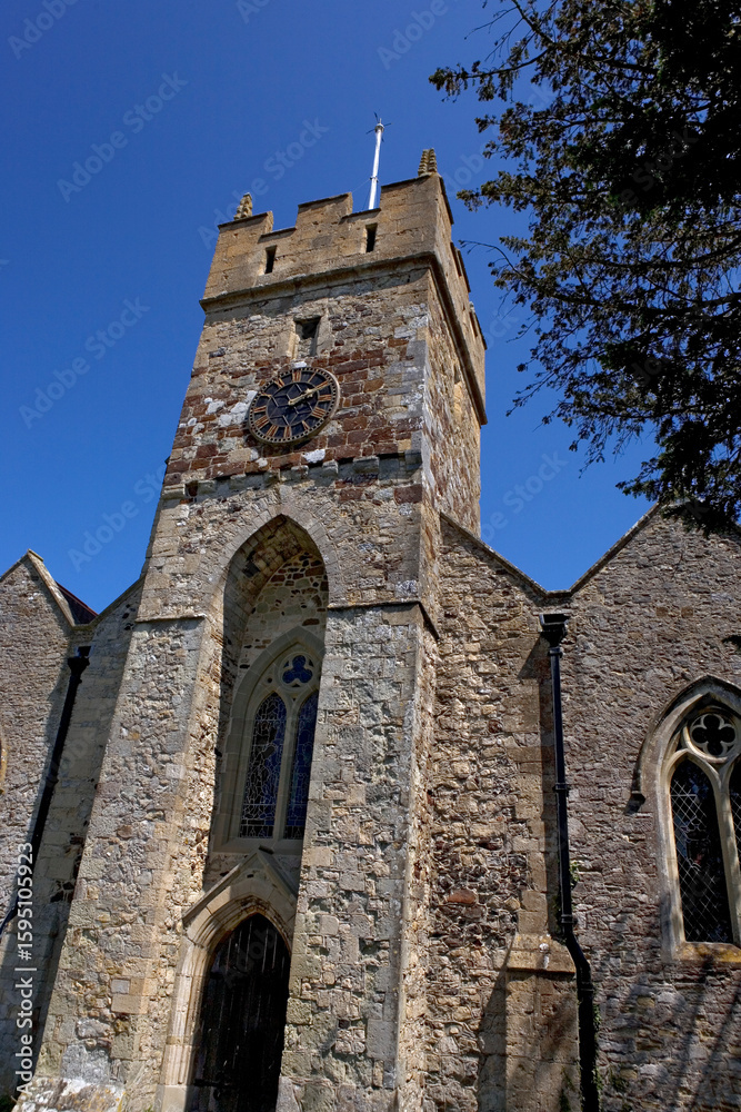 Obraz premium All Saints Church, Freshwater, Isle of Wight, UK: the 13th century tower with later added crenellations