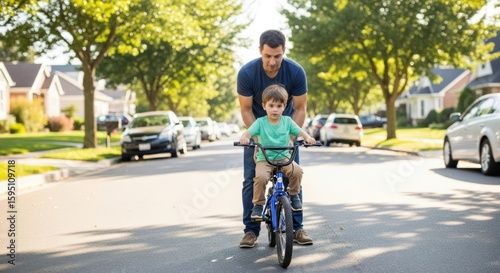 Wallpaper Mural A man and a child riding a bicycle in a suburban neighborhood. Torontodigital.ca