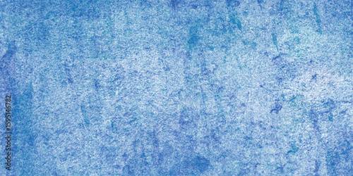 Abstract blue watercolor textured background showing various shades of blue colors giving a sense of depth and texture