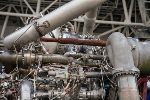 Photos The image shows the upper section of the engine with detailed piping, connections, and oxidizer feed lines