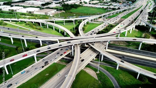Aerial view of a busy highway interchange with multiple overpasses