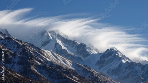 Wallpaper Mural Serene Time Lapse of Cloud Movement Above Majestic Snow-Capped Mountains Torontodigital.ca