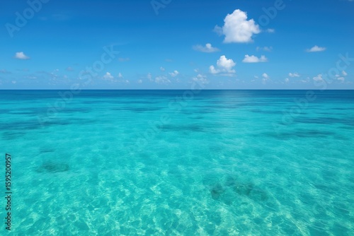Pristine turquoise ocean meeting endless sky horizon in breathtaking tropical paradise seascape