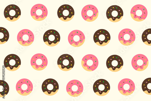 Tasty seamless donut pattern with strawberry and chocolate glaze on soft yellow