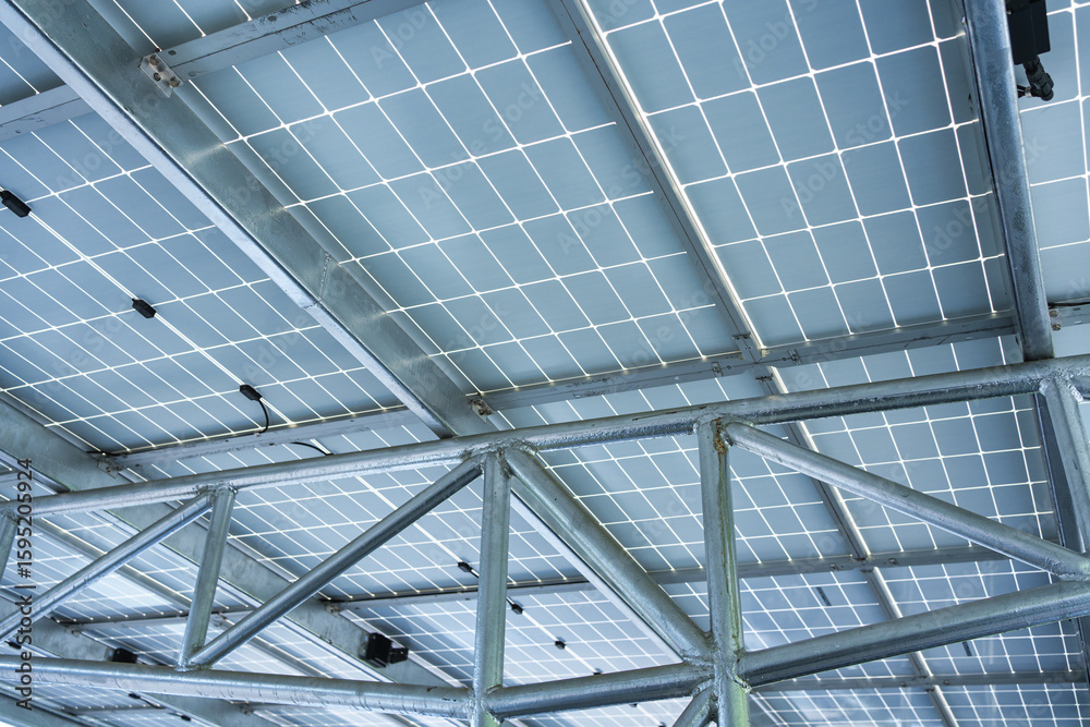 Fototapeta premium Solar panel roof structure installed over parking lot for clean energy solution