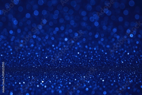 Luxurious royal blue glitter background with sparkling bokeh effects and deep sapphire tones perfect for elegant premium design applications