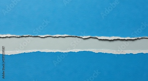 Torn Blue Paper Revealing Gray Layer Background