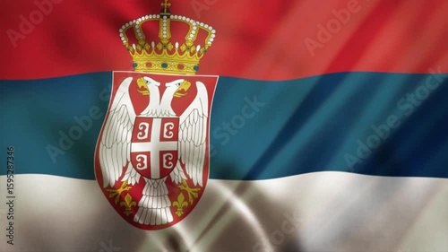The fluttering Serbian national flag is a symbol of the country fluttering in the wind.