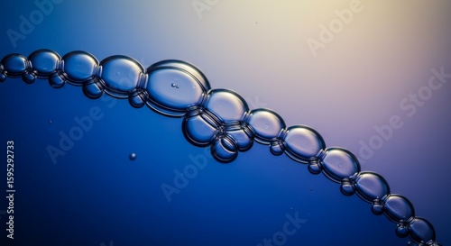 Aligned Water Droplets on Gradient Background Abstract